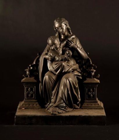 Vierge Vierge à l'enfant en régule socle en marbre.

Epoque XIXe siècle.

H. : 25...