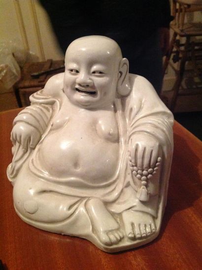 null Blanc de Chine Bouddha assis.
H. : 16 cm.