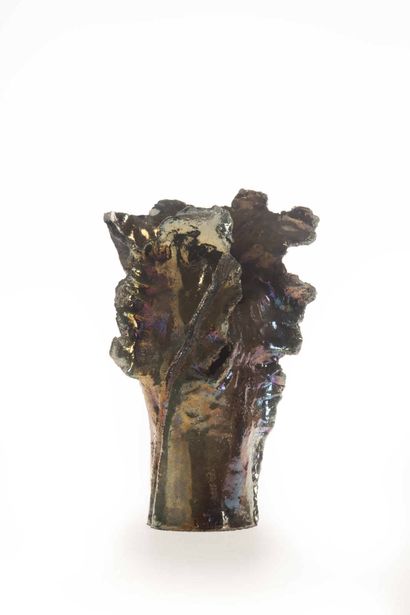 MASSIER Clément MASSIER (1844-1917)
Vase en faïence métallique orné d'une tête d'homme.
Epoque...
