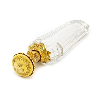 Flacon à parfum en cristal monture en or
Milieu...