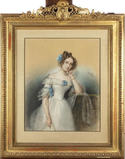 null École FRANCAISE DU XIXe
Portrait d'une jeune femme au ruban bleu
Pastel ou aquarelle
Cadre...