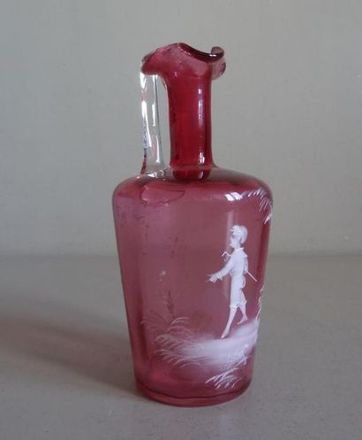 null Mary GREGORY (1856-1908), attribué à.
Petite verseuse en verre soufflé de couleur...