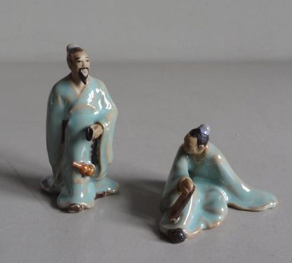 null CHINE
Deux petites statuettes en porcelaine polychrome représentant deux personnages...