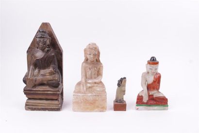 null ENSEMBLE composé de 4 sujets et bouddhas en pierre sculptée et traces de polychromie...