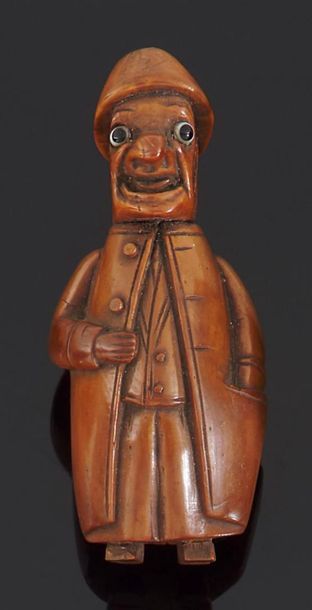 null TABATIERE en bois figurant un homme grotesque .
H : 10 cm.
XIXème siècle