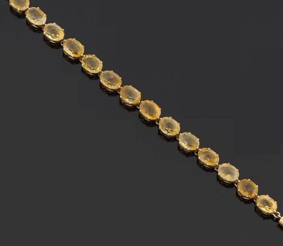 null Bracelet articulé en or jaune 585 millièmes, orné d'une ligne de quatorze citrines...