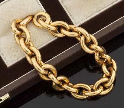 null Bracelet articulé en or jaune 750 millièmes, les maillons de forme ovale ajourée....