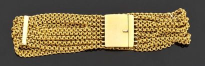 Bracelet huit rangs articulés en or jaune...