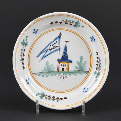 null Roanne

Assiette en faïence à décor polychrome révolutionnaire au centre d'un...