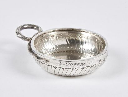 null Silver wine cup with gadroon decoration and friezes of dots. The handle is serpentine....