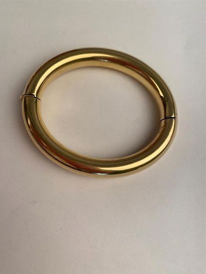 null Bracelet rigide ouvrant en or jaune 750 millièmes uni. (Usures)
Diamètre intérieur...