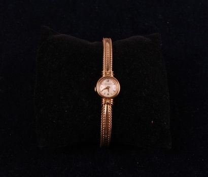 null Montre bracelet de dame en or jaune 750 millièmes, la montre de forme ronde,...