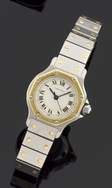 null CARTIER, modèle "Santos"
Montre bracelet de dame en acier et or jaune 750 millièmes....