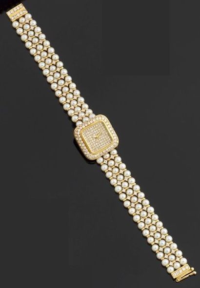 null Montre bracelet de dame, la montre de forme carrée en or jaune 750 millièmes...