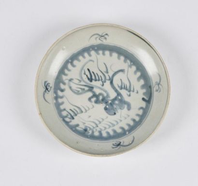 null China
Circular porcelain bowl decorated in blue under a cover of foaming waves.
18th...