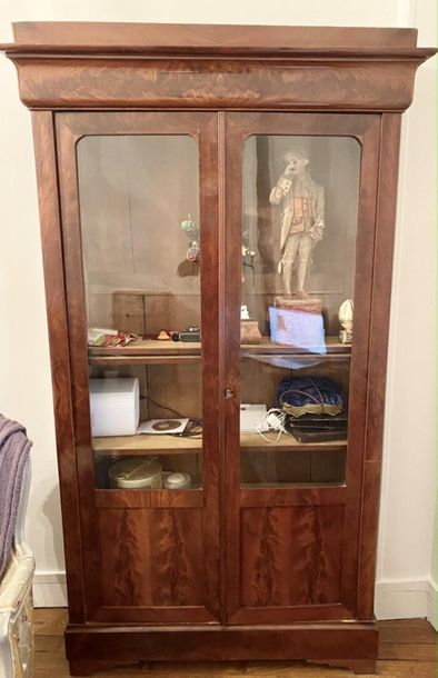 null Mahogany and mahogany veneer showcase opening with two glass doors, shower cornice,...