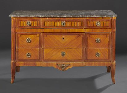 null Walnut and fruit wood COMMODE opening with three drawers, the frames in marquetry...