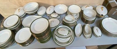 null LIMOGES
An important part of porcelain service with green and gold fillets decoration,...