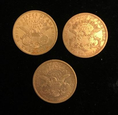 null ** Trois pièces de 20 dollars Liberty en or jaune 1875, 1877, 1878 
Frais de...