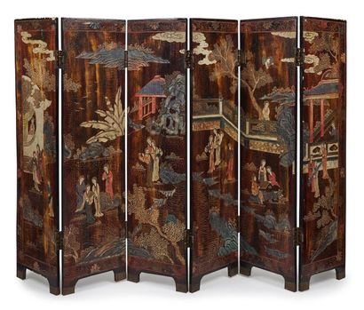 null CHINA - XIXth century
Small six-leaf screen in Coromandel lacquer, on one side...