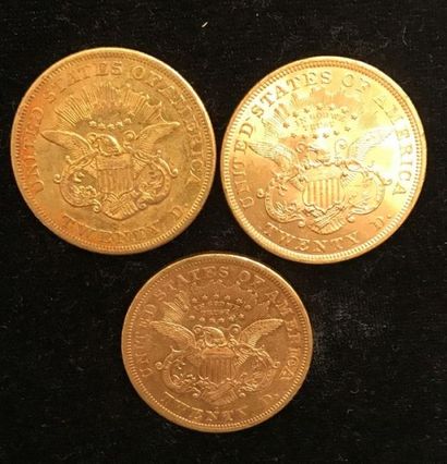 null ** Trois pièces de 20 dollars Liberty en or jaune 1857, 1871, 1873 
Frais de...