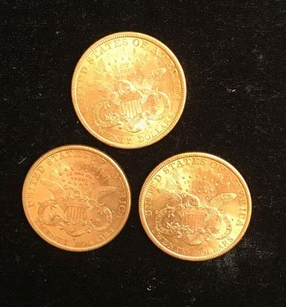 null ** Trois pièces de 20 dollars Liberty en or jaune 1896, 1897, 1899 
Frais de...