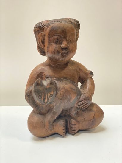 null Wooden subject showing an Indochinese girl with a cat. 

20th century 

High....