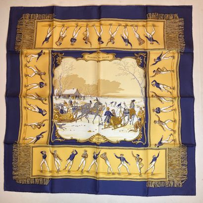 null HERMES Paris 

Silk square titled "Les plaisirs du froid" with navy blue border,...