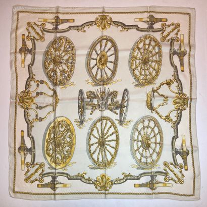 null HERMES Paris 

Silk square with Carosse wheel pattern by Caty cream background...