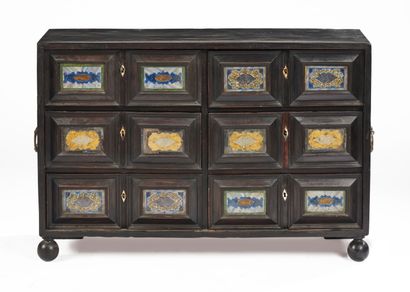 null Blackened wood cabinet opening to six drawers decorated with painted plates...
