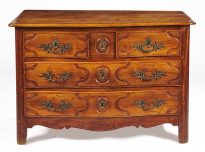 null Moulded fruitwood chest of drawers opening to five drawers on three rows, the...