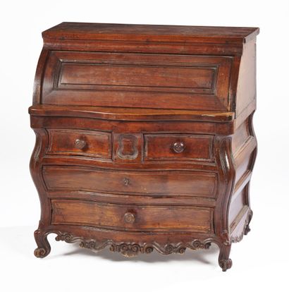 null A small walnut miniature scriban opening to a cylinder and four drawers.

Probably...