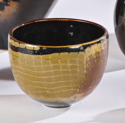 null Didier HOFT (né en 1957)

Vase conique en céramique à émail ocre, brun, rose...
