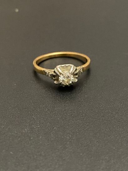 null Ring in yellow gold 750 thousandths and platinum 850 thousandths decorated in...