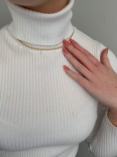 null Collier articulé en or jaune 750 millièmes à décor de torsades.

Longueur :...