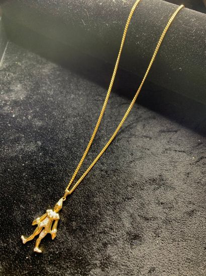 null Necklace articulated in yellow gold 750 thousandths holding in pendant a mobile...