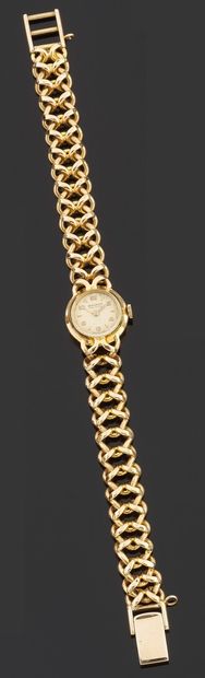 Bracelet watch of lady in yellow gold 750...