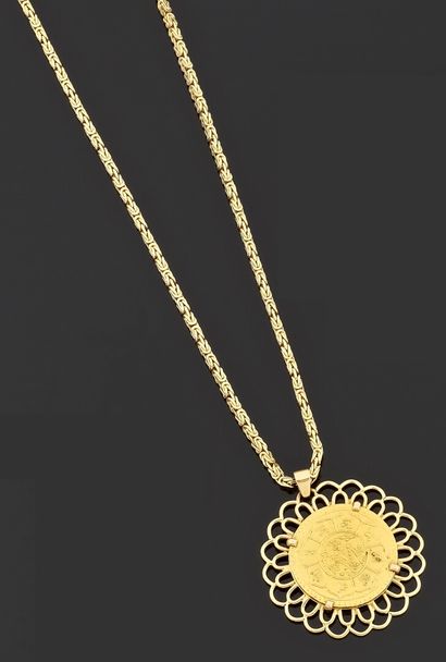null Necklace articulated in yellow gold 750 thousandths holding in pendant a disc...