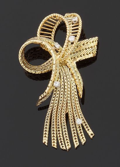 Brooch in yellow gold 750 thousandth and...