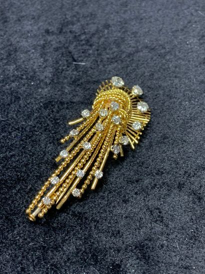 null Brooch in yellow gold 750 thousandths with decoration of knots and gold threads...