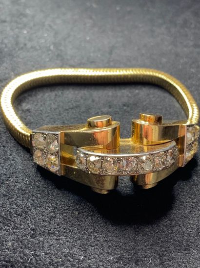 null Bracelet articulé tubogaz en or jaune 750 millièmes et platine 850 millièmes,...