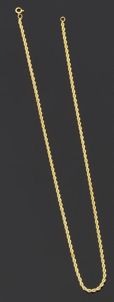 null Necklace articulated in yellow gold 750 thousandths with decoration of twists.

Length:...