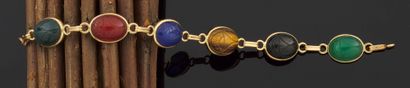 null Bracelet articulé en or jaune 750 millièmes orné de pierres ornementales de...