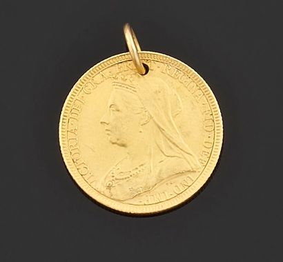 Medallion pendant with a gold coin.

Height...