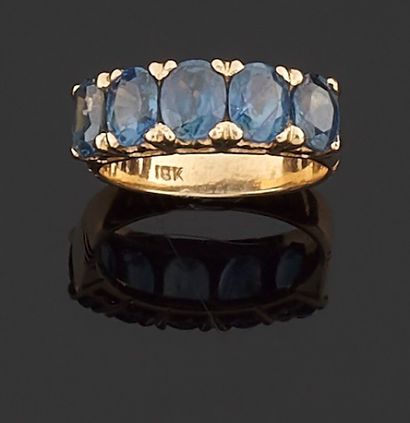 null Ring in pink gold 585 thousandths decorated in the center of a line of five...