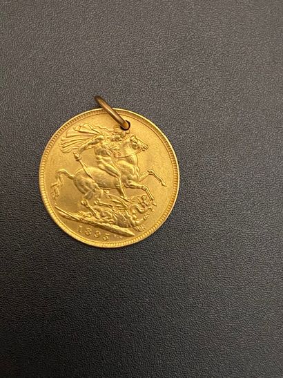 null Medallion pendant with a gold coin.

Height : 2,5 cm

Gross weight : 5,9 g