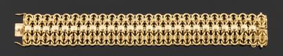 Bracelet articulé en or jaune 585 millièmes,...