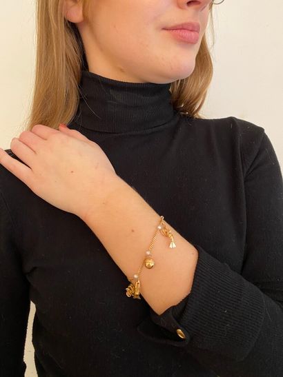 null Bracelet articulé en or jaune 750 millièmes orné de petites perles de culture...
