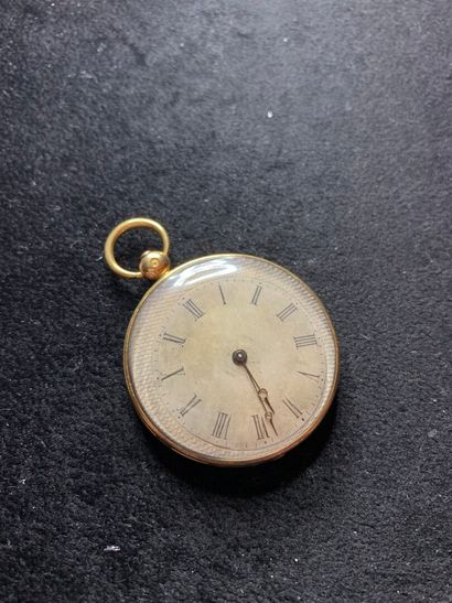 null Pocket watch in yellow gold 750 thousandth, the engraved bottom guilloche, enamelled...