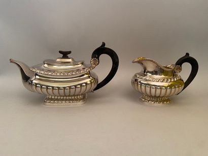 . PART OF TEA SERVICE in silver 950 thousandths including a teapot and a creamer,...
